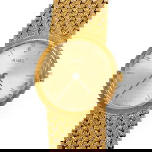 PIAGET VINTAGE 18K YELLOW GOLD HAND WIND LADIES WRISTWATCH: PIAGET VINTAGE 18K YELLOW GOLD HAND WIND LADIES WRISTWATCH Piaget Vintage 18k Yellow Gold Hand Wind Ladies Wristwatch Description This is an authentic ladies vintage watch by Piaget. The round shape c