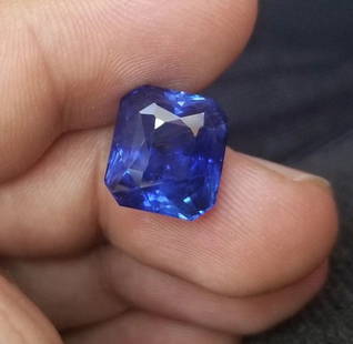 NATURAL GEM BLUE SAPPHIRE  RADIANT CUT  12.29CT.: NATURAL GEM BLUE SAPPHIRE RADIANT CUT 12.29CT. 12.29CT ROYAL BLUE HEATED CEYLON/SRI-LANKA SAPPHIRE For your 12h anniversary 12.29ct Loose Sapphire Loose Gemstone for an Unique Sapphire ring or Engagem