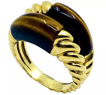 VAN CLEEF & ARPELS TIGER’S EYE GOLD VINTAGE RING: VAN CLEEF & ARPELS TIGER’S EYE GOLD VINTAGE RING VAN CLEEF & ARPELS TIGER’S EYE GOLD VINTAGE RING DESIGNER: Van Cleef & Arpels CIRCA: 1990’s MATERIALS: 18k Yellow Gold GEMSTONE: Tiger's