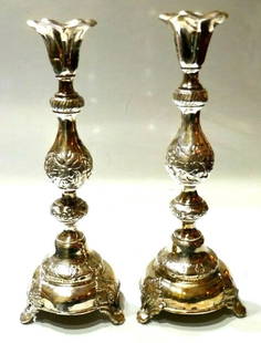 RUSSIAN SILVER PAIR OF CANDLESTICKS ANTIQUE: RUSSIAN SILVER PAIR OF CANDLESTICKS ANTIQUE RUSSIAN SILVER PAIR OF CANDLESTICKS ANTIQUE Russian Silver Pair of Candlesticks Antique · This is a must for a collector. The height is 11 3/4 inches. The