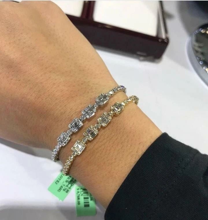 18KT GOLD EMERALD CUT DIAMOND BANGLE BRACELETS CUFF: 18KT GOLD EMERALD CUT DIAMOND BANGLE BRACELETS CUFF The Following Item we are offering are these Beautiful Rare Important 18KT Gold Sparkling Bracelet Cuff Bracelets. Bracelets featuer 1 18KT White Go