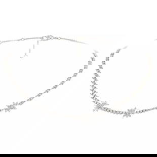 18KT GOLD DIAMOND STRAND FLOWER NECKLACE: 18KT GOLD DIAMOND STRAND FLOWER NECKLACE 18KT GOLD DIAMOND STRAND FLOWER NECKLACE The Following Item we are offering is a Rare 18KT White Gold Triple Flower Diamond Strand Necklace. Necklace is