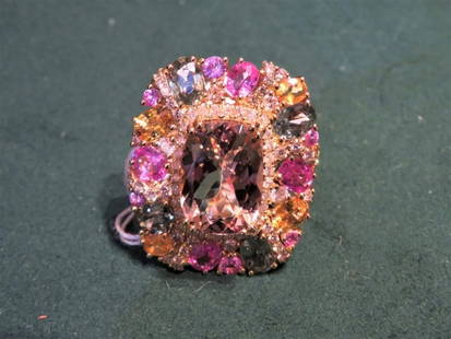 18KT GORGEOUS 12CT GLITTERING MORGANITE SAPPHIRE RING: 18KT GORGEOUS 12CT GLITTERING MORGANITE SAPPHIRE RING The Following Item we are offering is this Rare Important Radiant 18KT Gold Gorgeous Glittering and Sparkling Magnificent Fancy Cut Morganite
