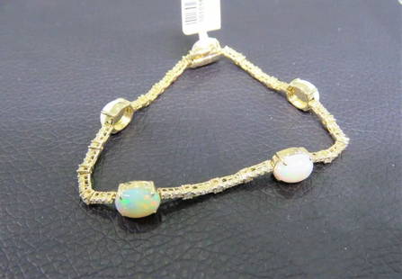 14KT YELLOW GOLD RARE OPAL DIAMOND BRACELET: 14KT YELLOW GOLD RARE OPAL DIAMOND BRACELET The Following Item we are offering is a Rare Important Radiant 14KT Yellow Gold Large Rare Fancy Gorgeous Opal Diamond Bracelet. Bracelet is comprised of LA