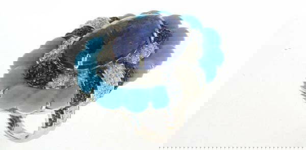 18KT GOLD OUTSTANDING TANZANITE TURQUOISE RING: 18KT GOLD OUTSTANDING TANZANITE TURQUOISE RING The Following Items we are offering is a Rare Important Radiant 18KT WHITE GOLD LARGE FANCY TANZANITE CABOCHON TURQUOISE BLUE SAPPHIRE DIAMOND RING. Ring