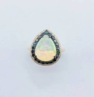 18KT GOLD FANCY OPAL BLUE SAPPHIRE DIAMOND RING: 18KT GOLD FANCY OPAL BLUE SAPPHIRE DIAMOND RING The Following Items we are offering is this Rare Important Radiant 18KT Gold LARGE Glittering and Sparkling Magnificent Fancy Colored Opal and Blue
