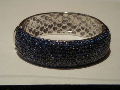 LOVELY WIDE BLUE SAPPHIRE CLUSTER CUFF BANGLE BRACELET 26CTS: LOVELY WIDE BLUE SAPPHIRE CLUSTER CUFF BANGLE BRACELET 26CTS LOVELY WIDE BLUE SAPPHIRE CLUSTER CUFF BANGLE BRACELET 26CTS The Following Item we are offering is this Rare Wide Blue FANCY BLUE