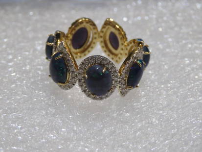 GOLD MULTI BLACK OPAL DIAMOND RING: GOLD MULTI BLACK OPAL DIAMOND RING The Following Items we are offering is a Rare Important Spectacular and Brilliant 18KT Gold Large Gorgeous Black Opal Doublet Diamond Ring. Ring consists of Rare