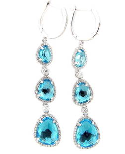 14KT GOLD 9.50CT FANCY BLUE TOPAZ DIAMOND DANGLE EARRINGS: 14KT GOLD 9.50CT FANCY BLUE TOPAZ DIAMOND DANGLE EARRINGS The Following Items we are offering is a Rare Important Estate Radiant 14KT Gold Large Fancy Blue Topaz and Diamond Dangle Drop Earrings. Earr
