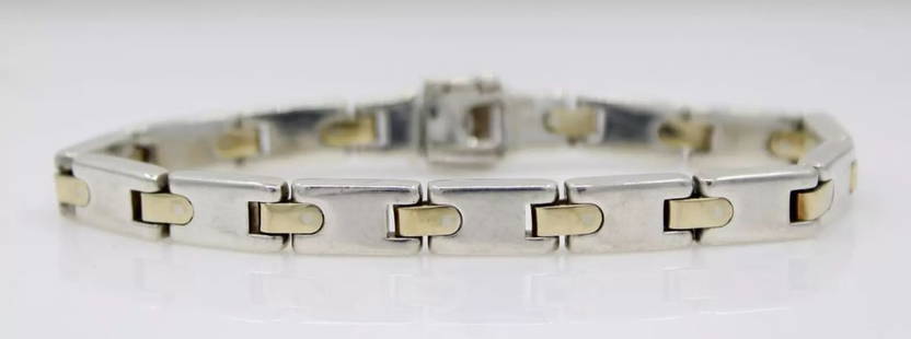 UNIQUE TIFFANY & CO. STERLING & 18K YELLOW GOLD RECTANGLE LINK 7.5" BRACELET: UNIQUE TIFFANY & CO. STERLING & 18K YELLOW GOLD RECTANGLE LINK 7.5" BRACELET UNIQUE TIFFANY & CO. STERLING & 18K YELLOW GOLD RECTANGLE LINK 7.5" BRACELET Description Unique Tiffany & Co. Sterling Silv