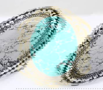 NAVAJO CHRIS TOM STERLING SILVER TURQUOISE CUFF BRACELET 7" - 116.2 GRAMS: NAVAJO CHRIS TOM STERLING SILVER TURQUOISE CUFF BRACELET 7" - 116.2 GRAMS NAVAJO CHRIS TOM STERLING SILVER TURQUOISE CUFF BRACELET 7" - 116.2 GRAMS Description Navajo Chris Tom Sterling Silver Turquoi