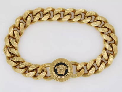 VERSACE ORIGINAL MEDUSA HEAD 14MM CURB GOLD CHAIN BRACELET 9" W/ BOX: VERSACE ORIGINAL MEDUSA HEAD 14MM CURB GOLD CHAIN BRACELET 9" W/ BOX Description Versace Original Medusa Head 14mm Curb Gold Chain Bracelet Bracelet is in good condition. May show signs of wear.