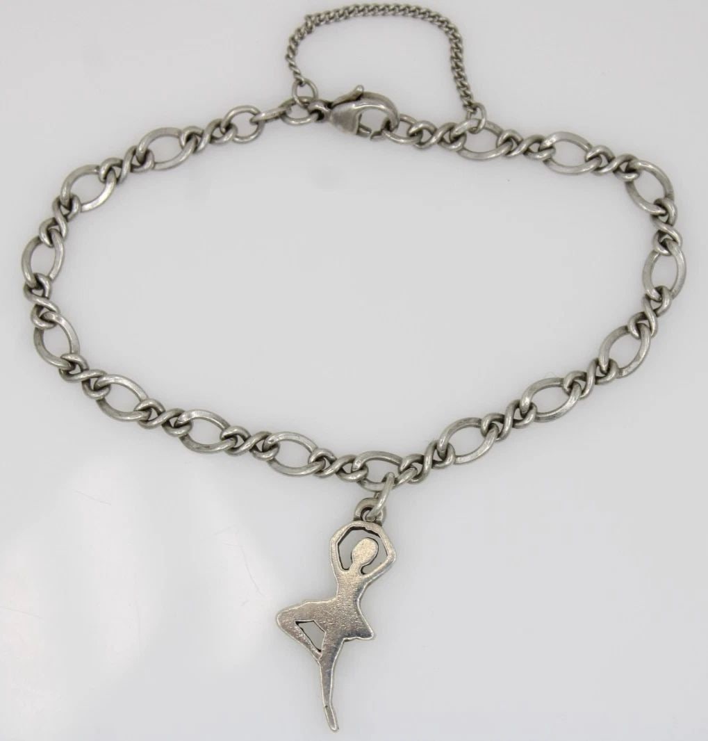 JAMES AVERY STERLING SILVER CHARM BRACELET W/ BALLERINA DANCER CHARM 7": JAMES AVERY STERLING SILVER CHARM BRACELET W/ BALLERINA DANCER CHARM 7" Description James Avery Sterling Silver Charm Bracelet W/ Ballerina Dancer Charm Bracelet is in good condition. May show signs o