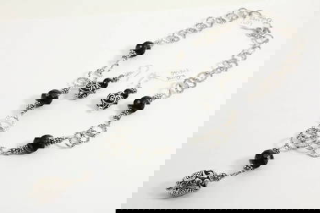 STERLING SILVER W/ BLACK BEADS 18" NECKLACE & PIERCED 1.5" DROP EARRING SET: STERLING SILVER W/ BLACK BEADS 18" NECKLACE & PIERCED 1.5" DROP EARRING SET STERLING SILVER W/ BLACK BEADS 18" NECKLACE & PIERCED 1.5" DROP EARRING SET Description Sterling Silver Necklace with