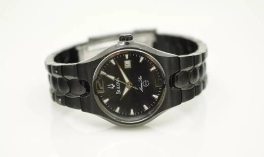 BULOVA MARINE STAR 29MM BLACK DATE DIAL QUARTZ WATCH C976699: BULOVA MARINE STAR 29MM BLACK DATE DIAL QUARTZ WATCH C976699 Description Bulova Marine Star 29mm Black Date Dial Quarts Watch C976699 The Bulova watch is in good condition. May show signs of wear and/