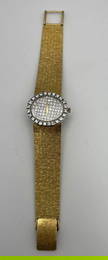 BUECHE GIROD 18K GOLD WATCH WITH DIAMOND BEZEL AND DIAMOND DIAL