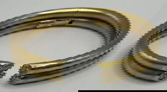 CHARLES TURI 18K YELLOW GOLD & DIAMOND BANGLE BRACELET: CHARLES TURI 18K YELLOW GOLD & DIAMOND BANGLE BRACELET Elevate your jewelry collection with the Charles Turi 18K Yellow Gold & Diamond Bangle Bracelet. This exquisite piece features a chic bangle