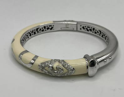 LA NOUVELLE BAGUE 18K WHITE GOLD AND DIAMOND BANGLE: LA NOUVELLE BAGUE 18K WHITE GOLD AND DIAMOND BANGLE 18K White Gold Bracelet with DiamondsBracelet has all stamps and markings.Original Box not included.Approximate weight is 35.2 grams. Approximate si