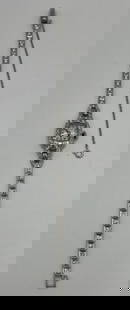 ART DECO HAMILTON LADIES DIAMOND AND PLATINUM WATCH: ART DECO HAMILTON LADIES DIAMOND AND PLATINUM WATCH Platinum and Diamond Ladies Hamilton WatchWeight is approximately 18.8 gramsThe watch has 34 round diamonds = approximately 1.10 ct, 34 sc diamonds