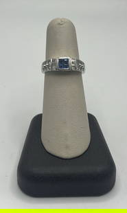 14K WHITE GOLD, DIAMOND & SAPPHIRE RING SIZE 6.75: 14K WHITE GOLD, DIAMOND & SAPPHIRE RING SIZE 6.75 This stunning 14K white gold ring features a sparkling diamond and a beautiful sapphire stone. The ring is a size 6.75 and crafted with the finest qua