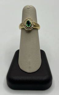 14KT YELLOW GOLD, GREEN SAPPHIRE, & DIAMOND RING SIZE 6.5: 14KT YELLOW GOLD, GREEN SAPPHIRE, & DIAMOND RING SIZE 6.5 This stunning ring is crafted from 14KT yellow gold and features a beautiful green sapphire stone, which is surrounded by sparkling diamonds.