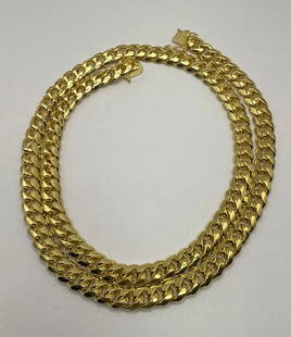 STERLING SILVER GOLD COLOR NECKLACE 30" MIAMI CUBAN LINK 81.3 GRAMS: STERLING SILVER GOLD COLOR NECKLACE 30" MIAMI CUBAN LINK 81.3 GRAMS Elevate your accessory collection with this sophisticated Sterling Silver Gold Color Necklace. The 30-inch Miami Cuban Link chain,
