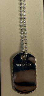 24" TIFFANY & CO. COIN EDGE DOG TAG PENDANT STERLING SILVER BEAD CHAIN NECKLACE: 24" TIFFANY & CO. COIN EDGE DOG TAG PENDANT STERLING SILVER BEAD CHAIN NECKLACE Tiffany &amp; Co. 20" bead chain with Tiffany &amp; Co. Sterling Silver Dog TagWeight is approximatly 23.4 gExcellent co