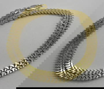 STERLING SILVER GOLD COLOR NECKLACE 30" FRANCO LINK: STERLING SILVER GOLD COLOR NECKLACE 30" FRANCO LINK Elevate your accessory collection with this elegant 20-inch sterling silver necklace. Its lustrous gold color adds a touch of sophistication to any