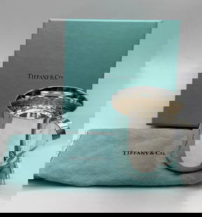 TIFFANY & CO STERLING SILVER BABY CUP: TIFFANY & CO STERLING SILVER BABY CUP The Tiffany & Co Sterling Silver Baby Cup is a delicate and exquisite piece made of high-quality sterling silver (.925). It is a charming and elegant cup, perfect