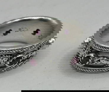 FOAL OF THE FOUR WINDS RING WITH 3MM RUBIES: FOAL OF THE FOUR WINDS RING WITH 3MM RUBIES Beautiful Foal of the Four Winds Sterling Silver and Ruby size 7 ringHas 6 3mm Rubies along band with figure of horse in between themApproximate weight is