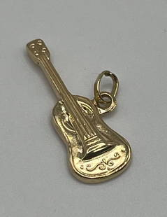 14K YELLOW GOLD GUITAR CHARM: 14K YELLOW GOLD GUITAR CHARM Add some musical flair to your jewelry collection with this charming 14K yellow gold guitar pendant. Crafted with a base metal of yellow gold and a metal purity of 14K, th