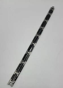 MEN'S STAINLESS STEEL BLACK ENAMEL BRACELET BY SHR (9"): MEN'S STAINLESS STEEL BLACK ENAMEL BRACELET BY SHR (9") Elevate your everyday style with this sleek Men's Stainless Steel Black Enamel Bracelet by SHR. Crafted from durable stainless steel, this link-