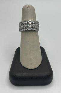 STERLING SILVER WIDE BAND WITH CZ SIZE 7: STERLING SILVER WIDE BAND WITH CZ SIZE 7 This stunning sterling silver ring boasts a wide band design and features a brilliant cubic zirconia stone at its center. Crafted with 925 purity, this piece