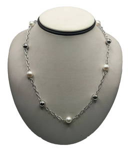 STERLING SILVER 18" LINK CHAIN WITH SILVER & WHITE BEADS: STERLING SILVER 18" LINK CHAIN WITH SILVER & WHITE BEADS This is a Sterling Silver 18" Link Chain necklace adorned with Silver & White Beads. The necklace is made of 925 Sterling Silver and features a
