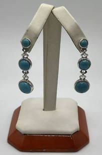WHITNEY KELLY TURQUOISE & STERLING SILVER EARRINGS: WHITNEY KELLY TURQUOISE & STERLING SILVER EARRINGS Elevate your style with these beautiful Whitney Kelly earrings. Crafted in 925 sterling silver and featuring gorgeous turquoise stones, these dangle/