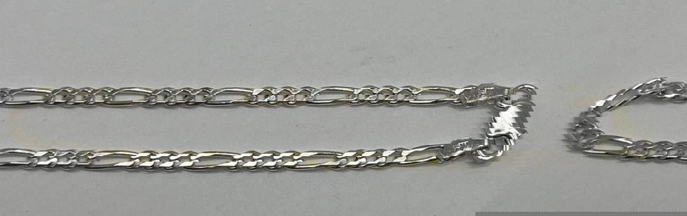 STERLING SILVER FIGARO BRACELET 7": STERLING SILVER FIGARO BRACELET 7" The product is a 7 inch Sterling Silver Figaro Bracelet made with 925 metal purity. This chain-style bracelet does not feature a main stone, making it a simple yet e