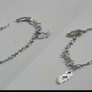 STERLING SILVER CHARM BRACELET WITH 3 HEARTS 6": STERLING SILVER CHARM BRACELET WITH 3 HEARTS 6" This Sterling Silver Charm Bracelet features three heart-shaped charms on a 6-inch chain. Made of 925 silver, this bracelet exudes a classic elegance wi
