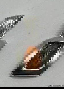 STERLING SILVER & AMBER PENDANT: STERLING SILVER & AMBER PENDANT This is a sterling silver pendant featuring a beautiful amber stone as the main focal point. The pendant is crafted with 925 sterling silver, giving it a high level of