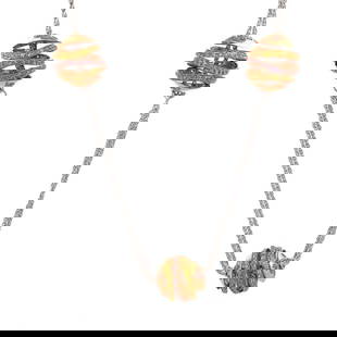 6730 SAPPHIRE 18K TRI-COLOR GOLD NECKLACE MULTI-RING MOTIFS DOUBLE CHAIN: 6730 SAPPHIRE 18K TRI-COLOR GOLD NECKLACE MULTI-RING MOTIFS DOUBLE CHAIN This is a beautiful necklace, it is crafted from 18k white, rose and yellow gold. There are 5 set of triple wheel slide charms