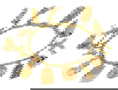 VINTAGE 18K & 14K YELLOW GOLD 12 TRAVEL THEME CHARMS CHAIN BRACELET LIQUIDATION: VINTAGE 18K & 14K YELLOW GOLD 12 TRAVEL THEME CHARMS CHAIN BRACELET LIQUIDATION Vintage 18k & 14k Yellow Gold 12 Travel Theme Charms Chain Bracelet LIQUIDATION Description This beautiful landmark and