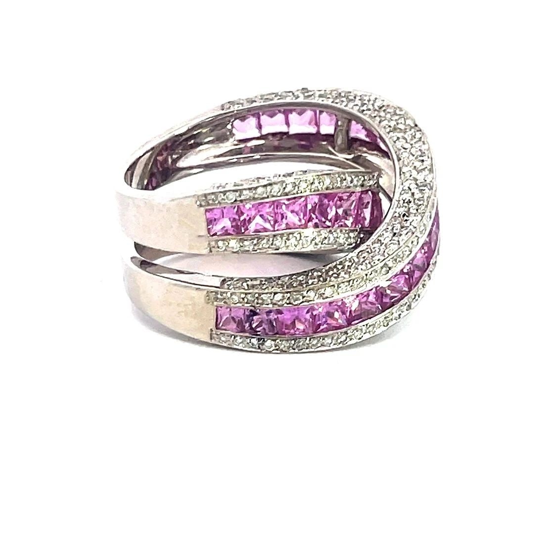 CRIVELLI DIAMOND GOLD RING PINK SAPPHIRE 7CT 18K WHITE CROSSOVER BAND SIZE 7: CRIVELLI DIAMOND GOLD RING PINK SAPPHIRE 7CT 18K WHITE CROSSOVER BAND SIZE 7 This gorgeous designer Crivelli ring is crafted from 18k white gold featuring double bands set in an X crossover design on