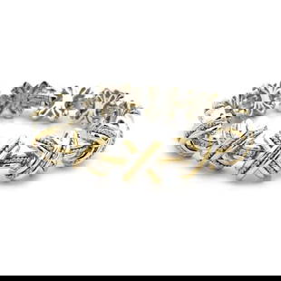 TIFFANY & CO. SIGNATURE X BRACELET STERLING SILVER 18K YELLOW GOLD 1990: TIFFANY & CO. SIGNATURE X BRACELET STERLING SILVER 18K YELLOW GOLD 1990 From the Signature X Collection by Tiffany & Co; this eye-catching bracelet is well crafted from sterling silver with 18k yellow