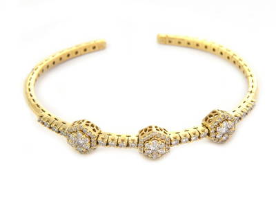 DIAMOND 18KT YELLOW GOLD 3 STATION FLEX BAND CUFF BRACELET: DIAMOND 18KT YELLOW GOLD 3 STATION FLEX BAND CUFF BRACELET 18k Yellow Gold Diamond 3 Station Flex Band Cuff Bracelet Description This is a lovely slim flex band is crafted from 18k yellow gold with