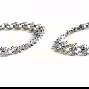 DIAMOND CIRCLE LINK BRACELET 1.50CT 14K WHITE GOLD FLEX STYLE: DIAMOND CIRCLE LINK BRACELET 1.50CT 14K WHITE GOLD FLEX STYLE This elegant bracelet is crafted from 14k white gold featuring alternating round and short bar links all with pave set diamonds. The 8mm