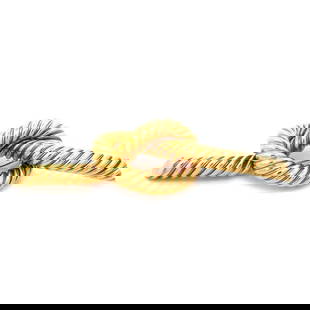 GOLD LARGE KNOT BROOCH 14K YELLOW ROPE STYLE: GOLD LARGE KNOT BROOCH 14K YELLOW ROPE STYLE This is an eye-catching large 10mm thick hallow tube with the twisted rope design with a single knot in the middle. The ends of the rope has a slanted
