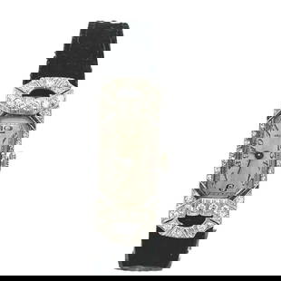 ART DECO DIAMOND PLATINUM HAND WIND ELONGATED LADIES WATCH: ART DECO DIAMOND PLATINUM HAND WIND ELONGATED LADIES WATCH This is a lovely Art Deco platinum hand wind ladies watch, the frame is a rectangle shape with elongated fancy lugs with diamonds around the