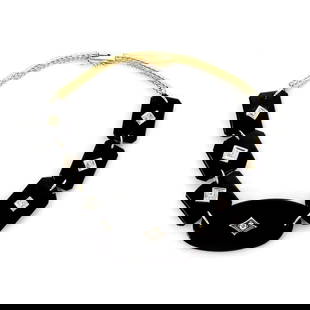 VINTAGE DIAMOND & ONYX 14K TWO TONE GOLD FANCY BRACELET LIQUIDATION!: VINTAGE DIAMOND & ONYX 14K TWO TONE GOLD FANCY BRACELET LIQUIDATION! Vintage Diamond & Onyx 14k Two Tone Gold Fancy Bracelet LIQUIDATION! Description This lovely bracelet is crafted from 14k yellow