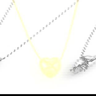 TIFFANY & CO. 18K YELLOW GOLD CROSSOVER HEART PENDANT NECKLACE: TIFFANY & CO. 18K YELLOW GOLD CROSSOVER HEART PENDANT NECKLACE Tiffany & Co. 18k Yellow Gold Crossover Heart Pendant Necklace Description This elegant authentic necklace is from Tiffany & Co. It is