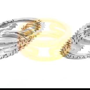 7052 BULGARI GOLD PARENTESI RING 18K YELLOW BAND OPEN DESIGN SIZE 6: Add some elegance to your jewelry collection with the Bulgari Parentesi Ring, a masterpiece crafted in 18k yellow gold. This lovely band showcases the luxury and craftsmanship synonymous with the