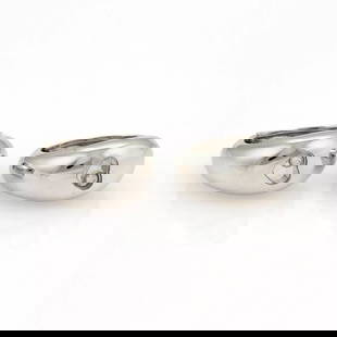 CHOPARD HAPPY DIAMONDS 18K WHITE GOLD HEART HOOP EARRINGS: CHOPARD HAPPY DIAMONDS 18K WHITE GOLD HEART HOOP EARRINGS Chopard Happy Diamonds 18k White Gold Hearts Hoop Earrings This is an authentic pair of earrings by Chopard from the Happy Diamond collection.